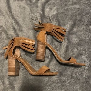 BCBG suede heels with fringe detail. Zipper in back